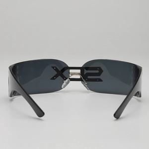 Cyberpunk rectangle shield sunglasses with rimless letter decor and sleek black finish