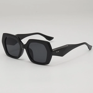 Chic black oversized geometric sunglasses with irregular thick frames and UV protection