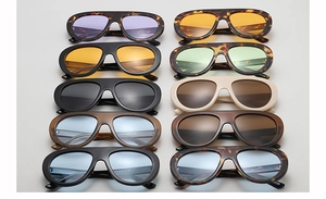 Grid display of vintage oval sunglasses in various tortoiseshell and solid frame colors