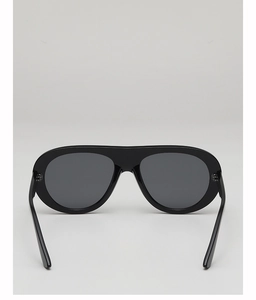 Front view of black oversized pilot sunglasses with sleek frame and dark gray lenses