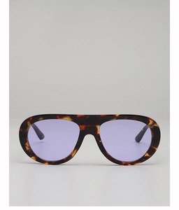 Detail of vintage aviator sunglasses with tortoise frame and purple tinted lenses