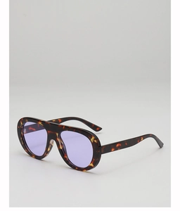 Detail view of tortoiseshell frame aviator sunglasses with purple tinted lenses