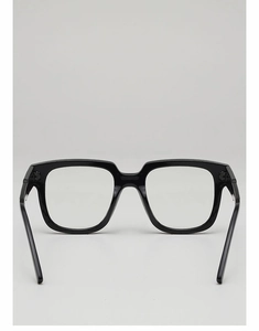 Rear top view of black square chunky frame glasses with polished finish on grey background