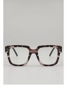 Macro shot of stylish square tortoiseshell eyewear frame with grey and white mottled texture