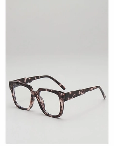 Detail of tortoise shell square eyeglass frames showing marble texture and side profile