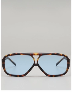 Front view of double-bridge tortoiseshell sunglasses with light blue lenses