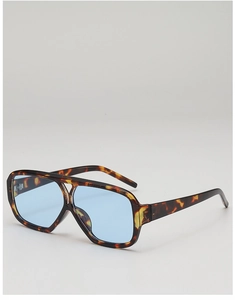 Detail of tortoise shell frame and light blue lenses on retro aviator sunglasses