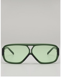 Detail of vintage aviator sunglasses with green translucent resin frame and double bridge