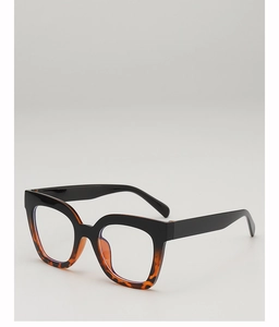 Detail view of retro square glasses frame featuring black top and leopard print accents