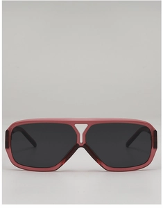 Close-up of translucent pink retro aviator frames with dark polarized lenses