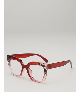 Detail of red tortoiseshell cat-eye glasses frame with leopard print accents