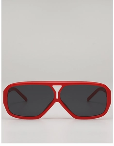 Macro view of bright red retro aviator sunglasses with stylish grey tinted lenses