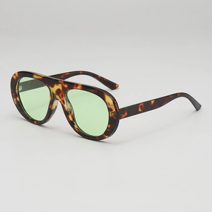 Vintage oversized aviator sunglasses with tortoise frame and light green lenses