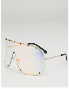 Detail showing oversized gradient shield sunglasses with silver metal frame and rivets