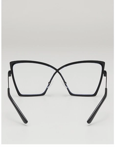 Detail view of the inner black cat-eye frame showing the bridge and temples design