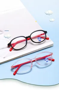 Detailed macro view of kids oval blue light glasses with modern candy color frames