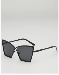 Close-up of black butterfly cat-eye frames with unique cross-bridge metal design