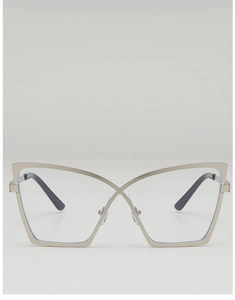 Macro shot of silver cat-eye glasses frame featuring a creative X-cross bridge design
