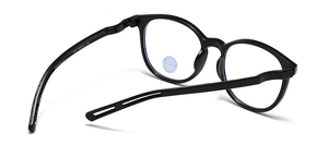 Gros plan détaillé d'une monture de lunettes ronde noire rétro avec spécifications