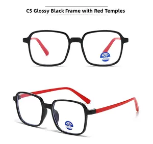 Detail view of square frame blue light blocking glasses in glossy black and red colors