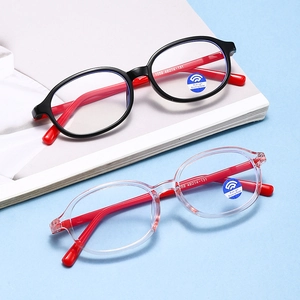 Kids vintage oval blue light blocking glasses with black and clear frames and red temples