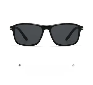 Detail view of square black sunglasses featuring silver metal accents on the temple hinges