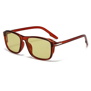 Square amber sunglasses with translucent frames and yellow lenses for a retro summer look
