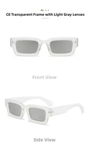 Détail de lunettes de soleil rectangulaires avec monture transparente et verres gris