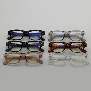 Detail of classic square eyeglass frames in six vintage colors with silver stud accents