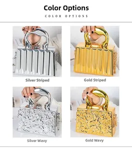Detail of silver and gold box bags featuring ribbed and wavy textures with ring handles