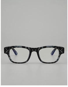 Close-up of square marble pattern eyeglass frames with three silver studs decoration