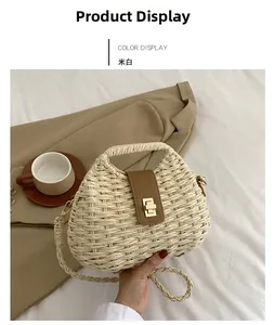Detail of beige woven crossbody bag with brown leather strap and gold rotary lock