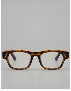 Detailed front view of vintage leopard print square eyeglass frames with metal rivets