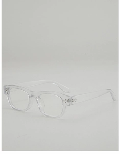 Detail of transparent square glasses frame with silver metal rivets on the temples