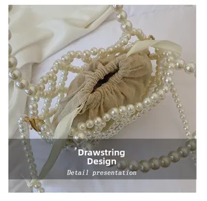 Detail showing the drawstring closure design of the beaded evening bag and inner lining