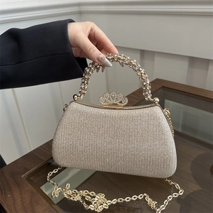 Elegant champagne gold sequin clutch with crystal handle and crown clasp for formal parties