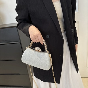 Silver sequin evening clutch bag with crown rhinestone clasp and pearl woven handle