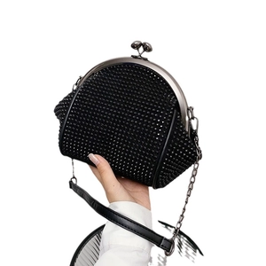 Sparkling black rhinestone evening clutch bag with metal frame and chain strap