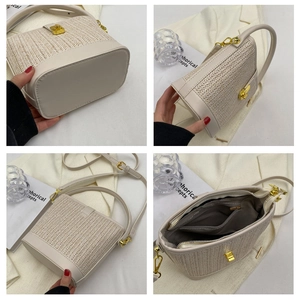 Detailed views of beige woven bucket bag with metal lock and internal compartments