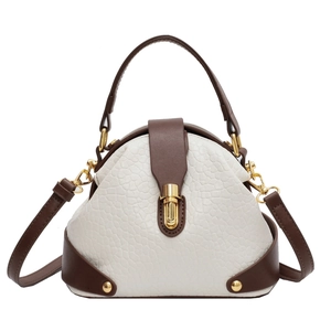Vintage doctor bag in white and brown leather with gold metal clasp and top handle