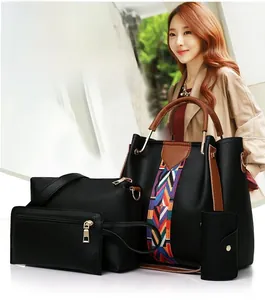 Vue détaillée de l'ensemble de 4 sacs en cuir noir avec sangle tissée colorée