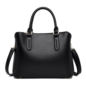 Black lychee leather tote bag with top handle, gold hardware and adjustable strap