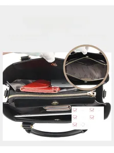 Macro detail of the spacious interior with zippered compartments and branded lining