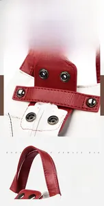 Detail of snap button shoulder strap on red and white leather crossbody bag with silver hardware
