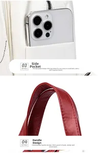 Detail of the side pocket with phone and red textured leather handle of the handbag