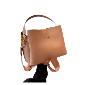 Pink lychee texture leather tote bag with gold hardware and detachable shoulder strap