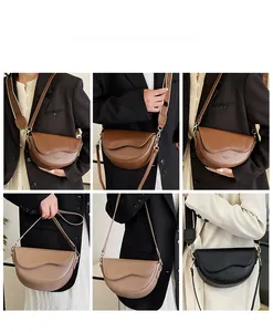 Three-color minimalist saddle bags showing model crossbody styling and broad strap details