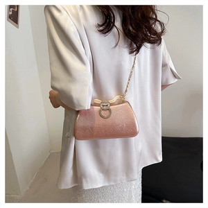 Pink glitter evening clutch bag with rhinestone buckle and gold chain strap