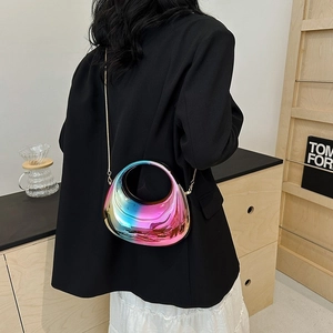 Iridescent laser finish half-moon handbag with slim metal chain shown on model