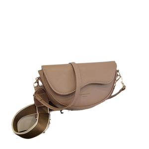 Classic retro brown saddle bag for women with wide fabric strap and asymmetric flap
